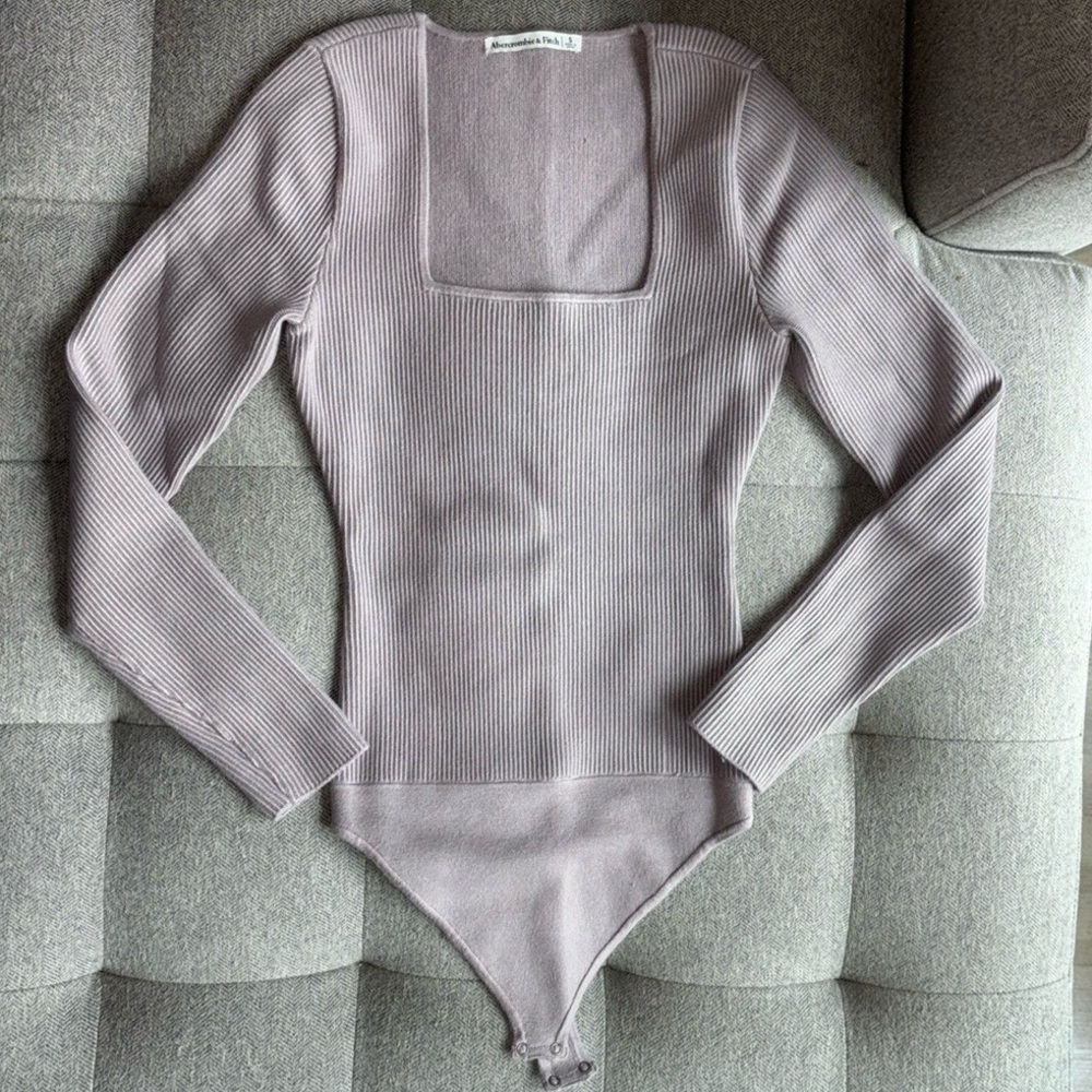 Long-sleeve Abercrombie bodysuit.